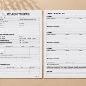 May include: Two white sheets of paper featuring an employment application and employment history form with black text and grid lines. The forms include sections for applicant information, education, skills, professional references, and certification.