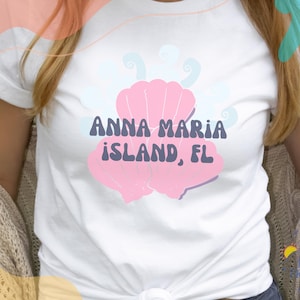 Anna Maria Island, FL Pastel Seashell front Bella + Canvas Unisex T-Shirt - Hurricane Relief Donation - Coastal Island Beach Gift Tee