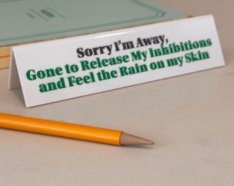 Desk Sign - Gone to Release my Inhibitions and Feel the Rain on my Skin