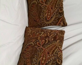 Brown and orange floral throw pillow