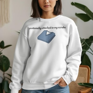 Attached To My Scrubs Sweatshirt, Funny Nurse Crewneck, Medical Healthcare Gift, Nursing Student Pullover, Cute RN Doctor Graphic Top