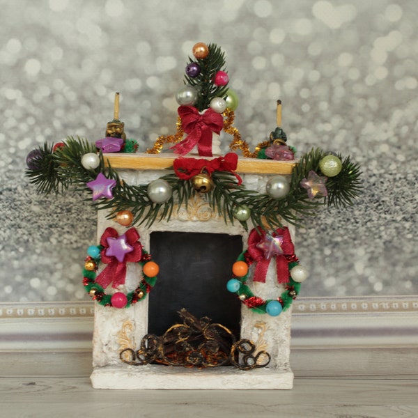 Christmas fireplace for the dollhouse. Decorated fireplace for the New Year's doll house. New Year's miniature fireplace.