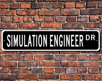 May include: Black and white street sign with the text "SIMULATION ENGINEER DR." on a brick wall background.