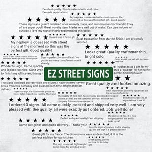 a green street sign sitting on top of a piece of paper