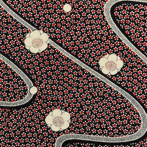 May include: Close-up of a fabric with a repeating pattern of small red flowers on a black background. White, stylized flower shapes and curved lines with dotted borders are also present, creating a decorative textile design.