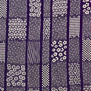 May include: A deep purple fabric featuring a repeating vertical panel pattern. Each rectangular section contains distinct white geometric motifs, including small floral clusters, dense polka dots, grid lines, and wavy dotted vertical stripes.