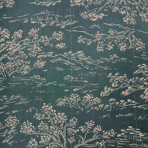 May include: A dark green wallpaper featuring a repeating landscape pattern of stylized trees with light pink and white foliage. The design includes horizontal lines suggesting rolling hills and terrain, creating a dense, layered forest scene.