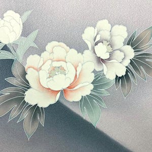 May include: A delicate floral design featuring three white peonies with pink centers, set against a soft gray background. The peonies are surrounded by green leaves, creating a sense of natural beauty.