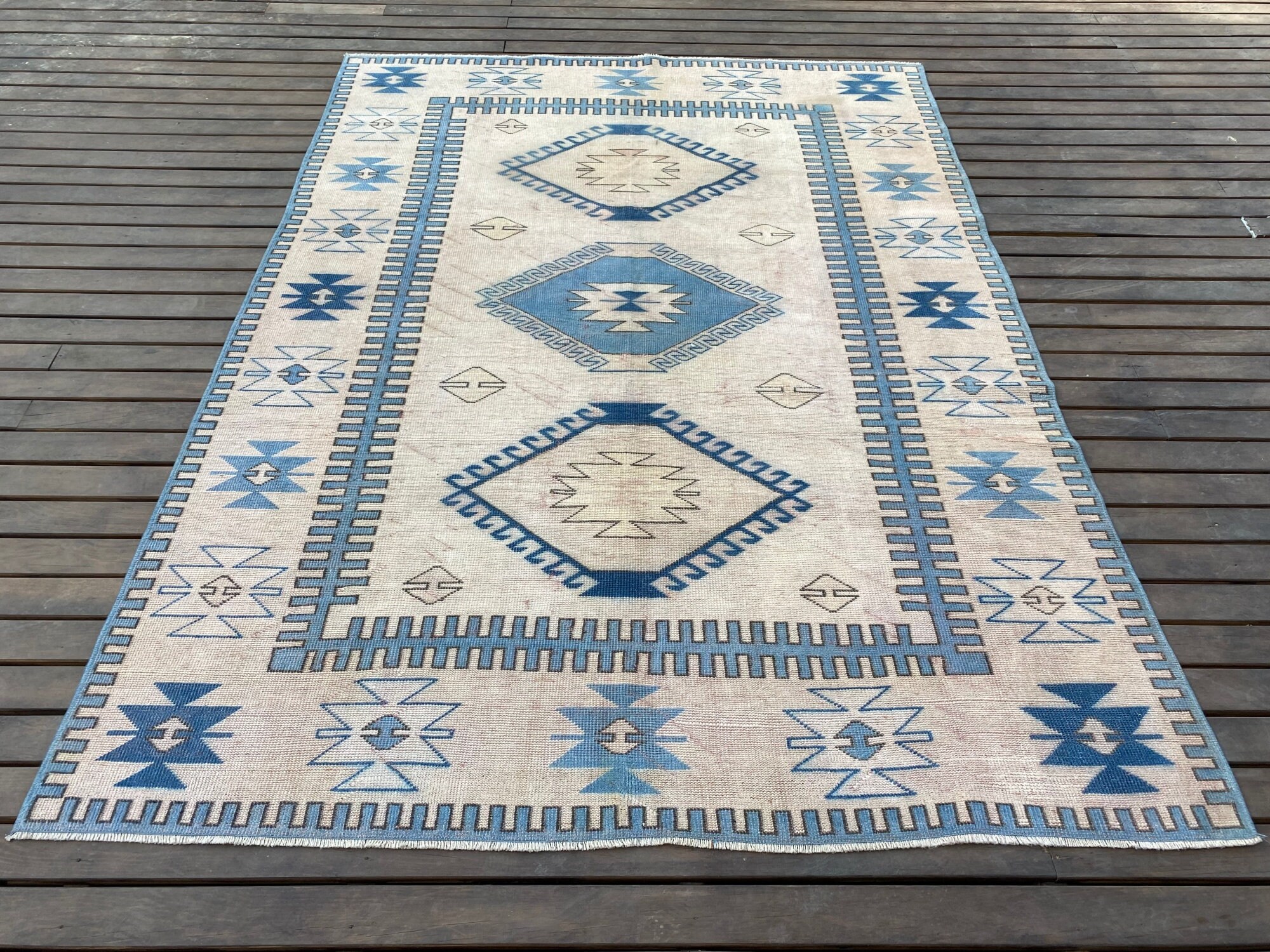 Tapis turc bleu, Tapis