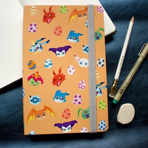 A5 notebook Digimon orange design  100 pages
