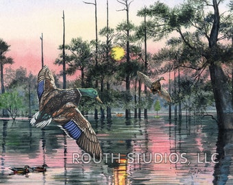 May include: A watercolor painting of a duck flying over a lake with trees in the background. The sky is a soft pink and the water is reflecting the light. The painting is signed "Gary Routh" and has the text "ROUTH STUDIOS, LLC" at the bottom.