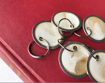 Altered Vintage Stained Key Tags . Set of SIX . Metal Rim Tags with O-Rings . Journal Embellishments . Round Tags . Price Tags/Gift Tags .