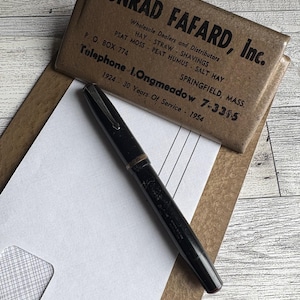 Small Vintage Metal Advertising Clipboard .  Vintage Office . Memo / Photo Holder . Conrad Fafard, Inc. , Springfield, MA . Great Graphics!
