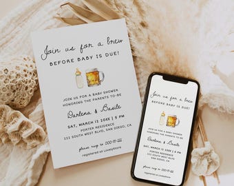 May include: A baby shower invitation with the text "Join us for a brew BEFORE BABY IS DUE!" is displayed on a white card and a smartphone. The invitation includes a baby bottle and a beer mug graphic.