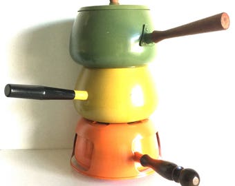 Instant collection: Fondue pot trio in yellow, orange, and green