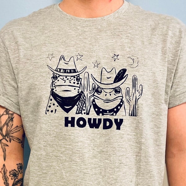 Howdy Cowboy Frog Tshirt- Unisex funny colorful toad and frog wearing cowboy hats with cactus in desert multicolor short sleeve shirt