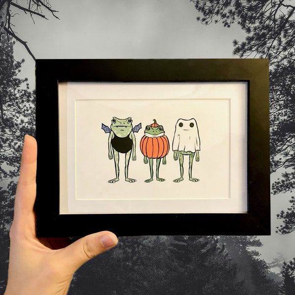 Halloween Frogs Framed Print - spooky cute Toad and Frog in pumpkin ghost and bat  costumes wall art