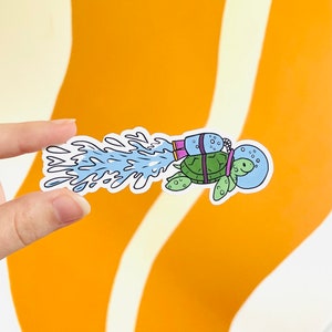 Jetpack Seaturtle Sticker - holographic 4x1.5" vinyl laptop sticker funny underwater astronaut turtle in space