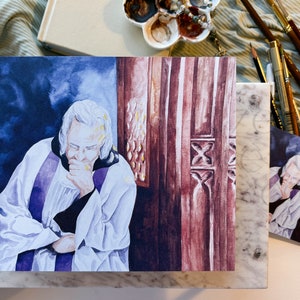 May include: A watercolor painting of a person in a white robe with a purple sash, sitting with their head in their hands. The background is a dark blue and a wooden door with intricate carvings.