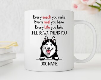 May include: White ceramic coffee mug with a black and white husky dog illustration. The mug has the text "Every snack you make, Every meal you bake, Every bite you take, I'LL BE WATCHING YOU, DOG NAME".