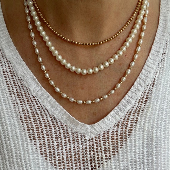 White Cultured Rice Pearl Choker Necklace 14k Yellow Gold-filled Made in the USA White Cultured Rice Pearl Choker Necklace 14k Yellow Gold-filled Made in the USA