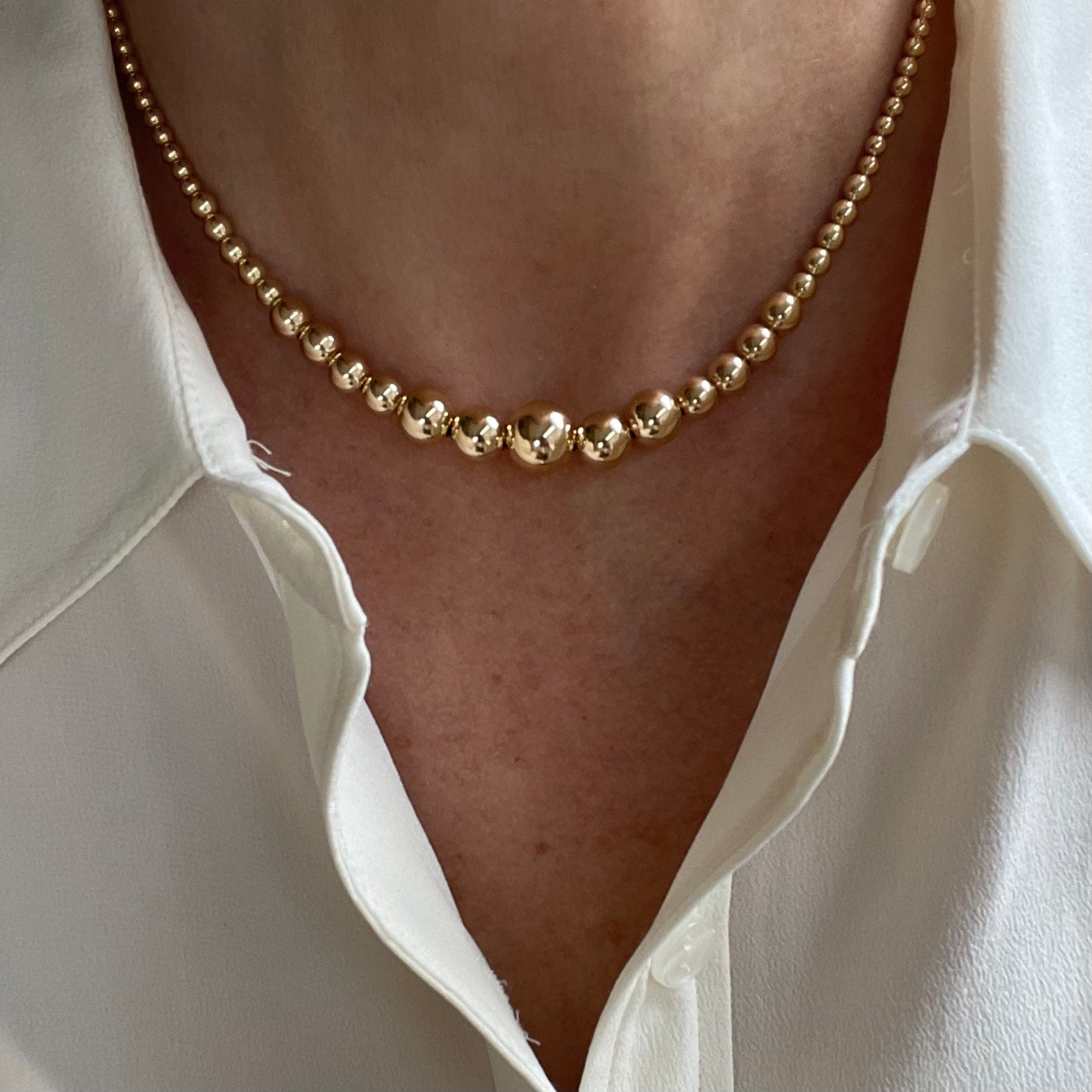 Graduated gold ball necklace clearance