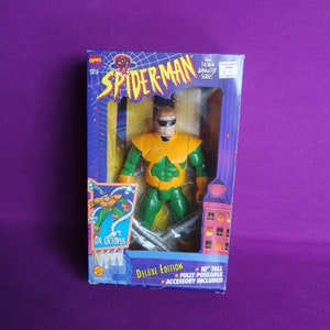 May include: A 10-inch tall action figure of Dr. Octopus from the Spider-Man animated series. The figure is green and orange with a detailed sculpt and is fully poseable. The figure comes with an accessory.