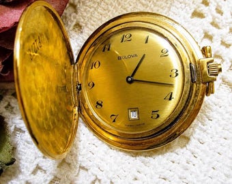 Reloj de bolsillo BULOVA Full Hunter de los años 70 ~ Vintage SUIZO MADE 17 joyas Oro Reloj mecánico ~ Funciona
