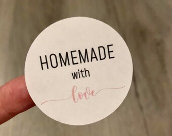 May include: White round sticker with the text "HOMEMADE with love" in black and pink lettering.