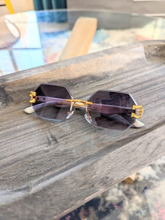 Occhiali da sole vintage anni 2000 con montatura in metallo