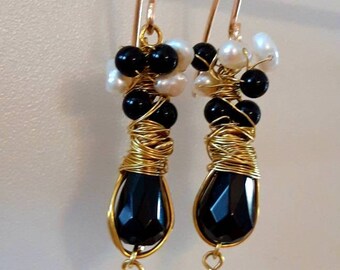 Earrings with onyx and freshwater pearls