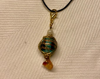 Pendant with glass bead