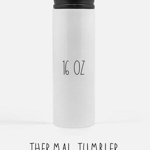 May include: White 16 oz thermal tumbler with a black lid. THERMAL TUMBLER is printed on the bottom of the tumbler.