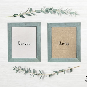 May include: Two framed canvases, one with a white canvas and the text "Canvas" and the other with a burlap canvas and the text "Burlap". The frames are a light blue color. The word "Blue" is written in cursive at the bottom of the image.