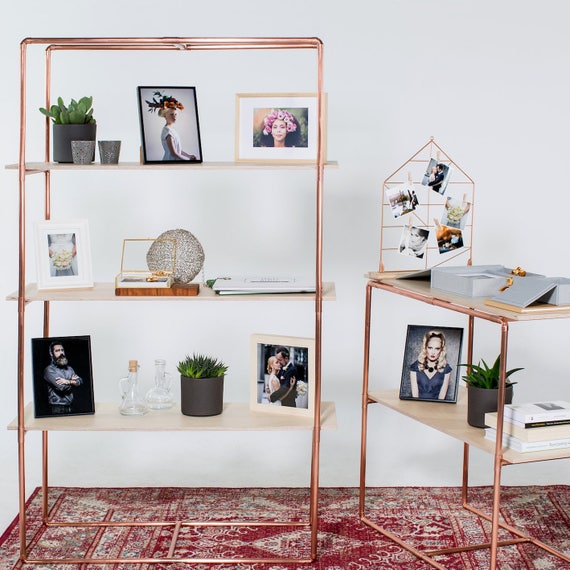 Shelving Made Of Copper Pipe And Plywood Trade Show Display Rose Gold Minimal Look Exhibition