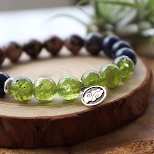 EVOLUTIONARY Peridot. COMPASSION Rhodonite. CONFIDENCE Sodalite. Genuine Natural Gemstone Bracelet.