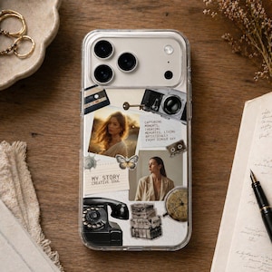 May include: Transparent phone case with a collage design. It includes photos, a vintage camera, a cassette tape, and the text "CAPTURING MOMENTS, CREATING MEMORIES, LIVING ARTISTICALLY EVERY SINGLE DAY."