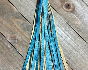 Portachiavi con ciondolo per borsa e nappa in pelle blu