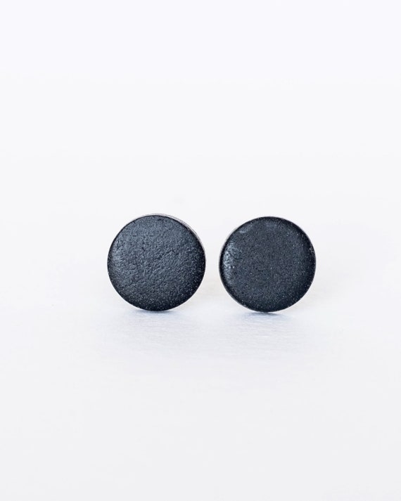 Flat black circle store stud earrings