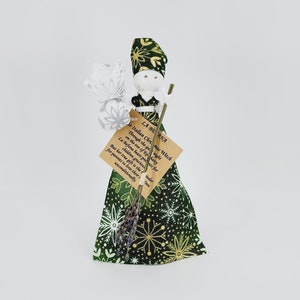 La Befana with green dress, gold and white snowflakes with white, silver swirled sack. Hanging Christmas witch. Ornamental. Italian Novelty