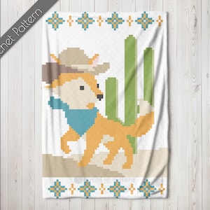 May include: A crochet pattern featuring a cartoon fox wearing a cowboy hat and bandana, standing in front of a cactus. The pattern is framed by a border of teal, yellow, and orange squares.