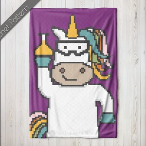 May include: A crochet pattern for a unicorn wearing a lab coat and holding a beaker. The unicorn is white with a rainbow mane and tail. The background is purple.