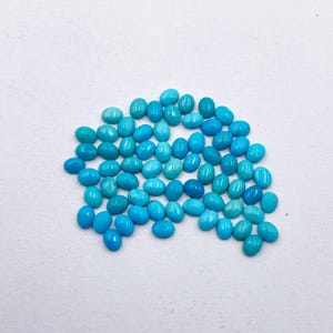 Sleeping Beauty Turquoise Oval Cabochon Loose Gemstone Lot 58 Pcs 3*4 MM 10 CT, Arizona Turquoise Stone For Jewelry Making.