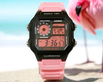 Reloj Casio World Time AE-1200WH personalizado Casio Royale Mod All Black Pantalla rosa Cristal templado gratis y correa adicional
