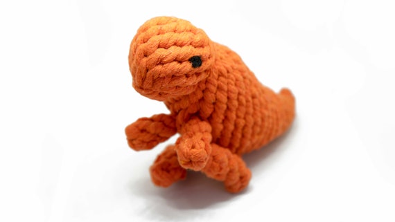 orange dinosaur dog toy