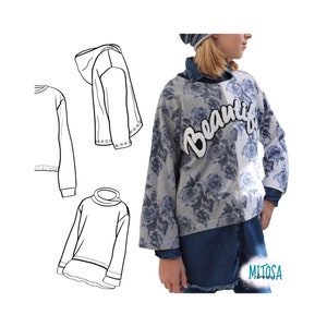 以下が含まれることがあります： 白い文字で「Beautiful」と書かれた、花柄のグレーのトレーナー。トレーナーは、片側に白い花柄、もう片側にグレーの花柄という、分割されたデザインになっています。