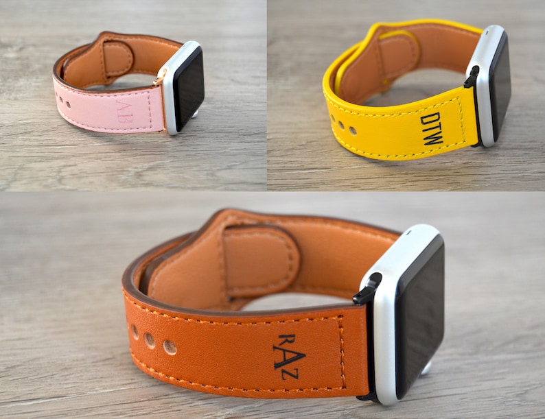 May include: Three Apple Watch bands in different colors: pink, yellow, and brown. Each band is made of leather and has a personalized inscription. The inscriptions are "ALS", "DTW", and "RAZ".