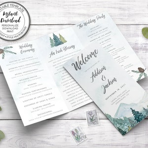 May include: A wedding ceremony program with a watercolor mountain and forest design. The program includes the wedding ceremony order, an Irish blessing, and the wedding party. The wedding date is September 18, 2021, and the couple's names are Addison and Jackson.