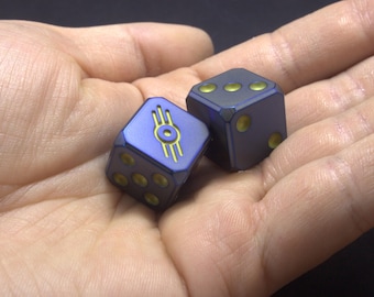 Titanium Vault-Tec Logo Dice &quot;Slightly Irradiated&quot; Finish., Inspired by the Fallout Series. Grade 5 Titanium. Logo on pip &quot;6&quot;.