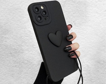 Funda de teléfono de corazón negro estético con correa de muñeca para iPhone 15 Pro Max 14 Pro 13 12 11 Lindo iPhone 14 13 12 11 X XR XS Max X 7 8 Plus Caso